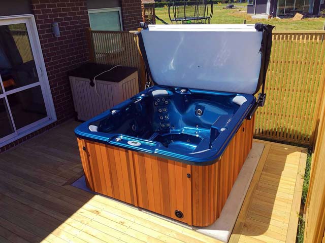 A Caledonia spa in Deep Waters Blue colour