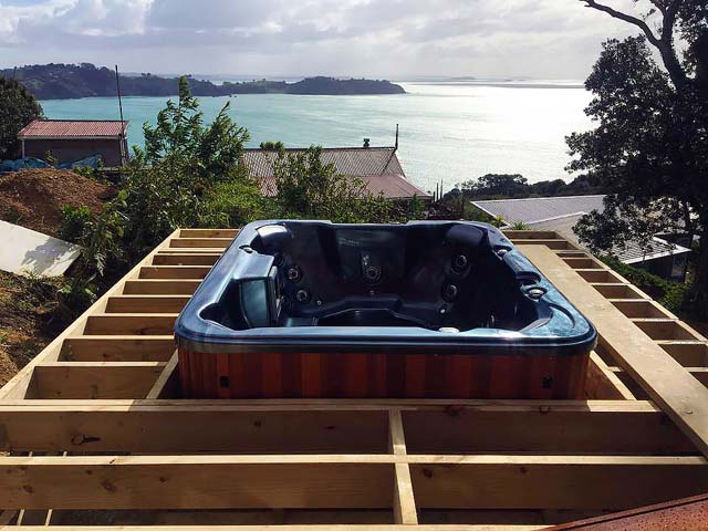 Deliver a Caledonia Spa to Waiheke Island.